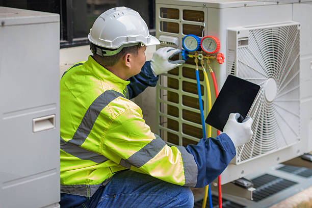 Professional Air Conditioning Repair technician working in Miller Place, NY
